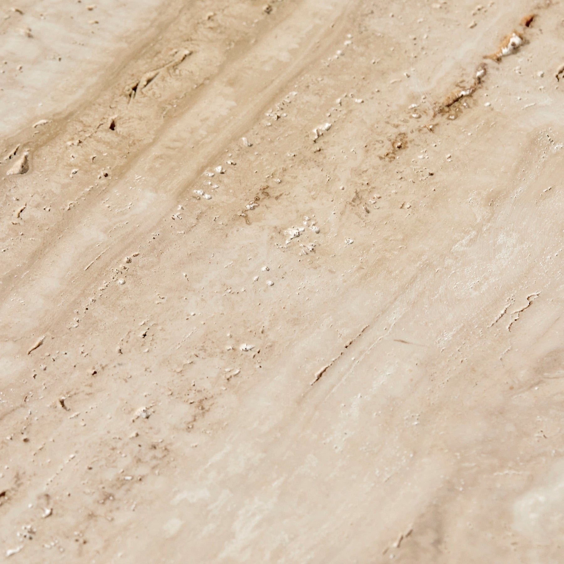Close-up detail of Travertine Romano marble.