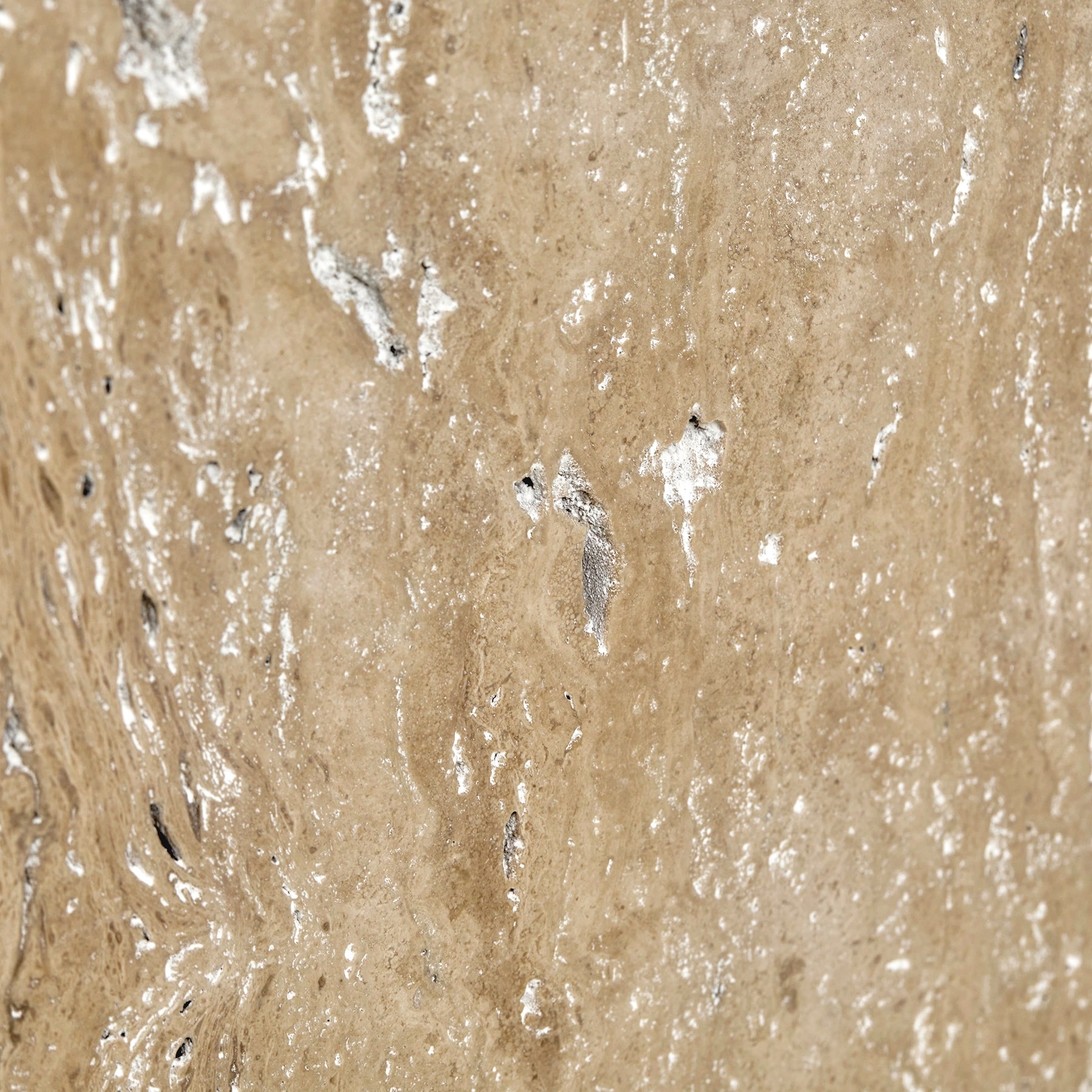 Close-up detail of Travertine Romano marble.