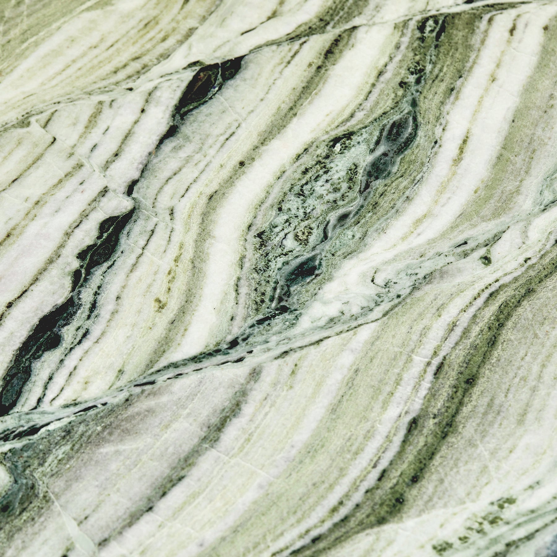 A close-up detail of Raggio Onyx marble.