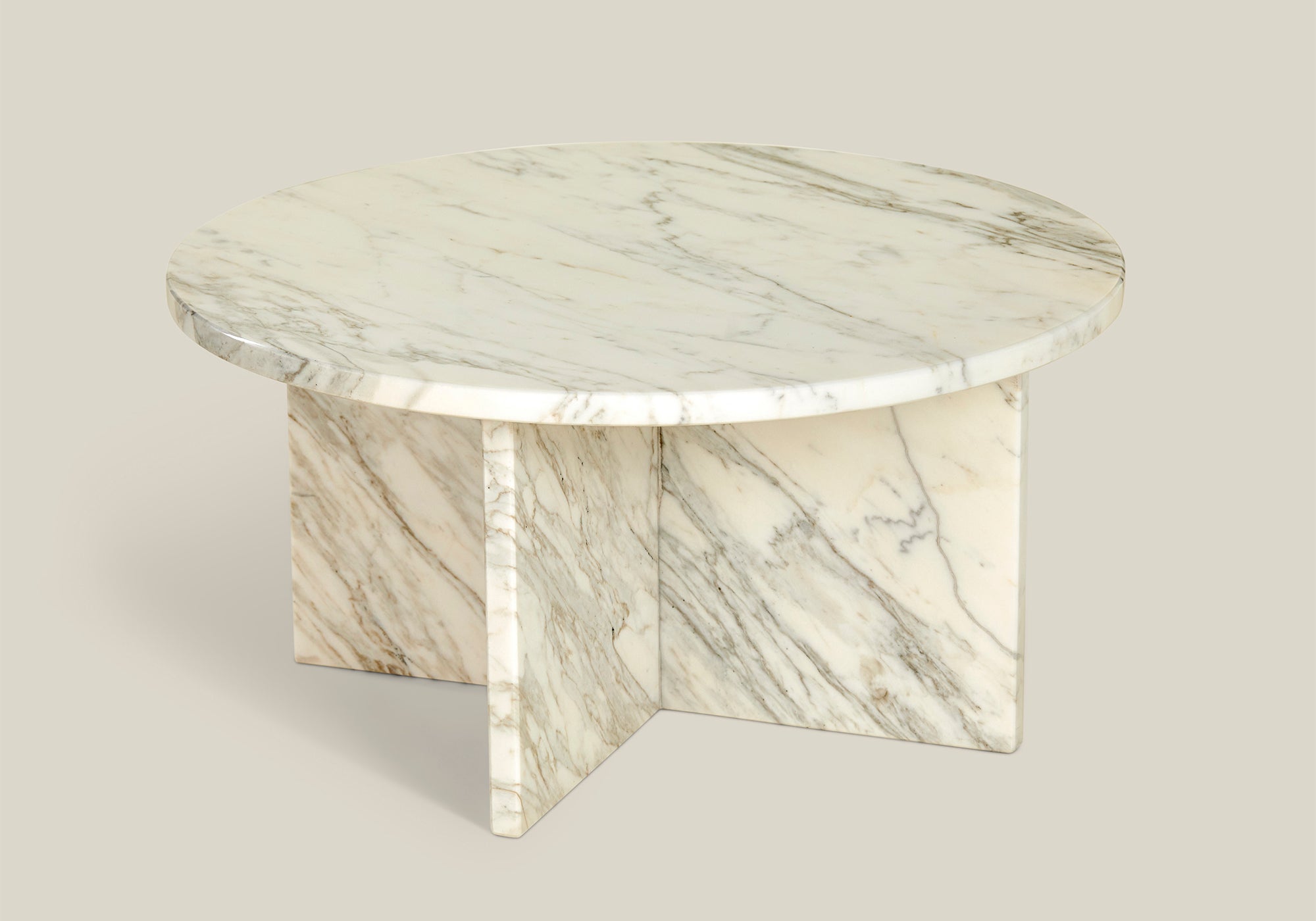 Leo round coffee table, an elegant design made from white veined Calacatta marble.