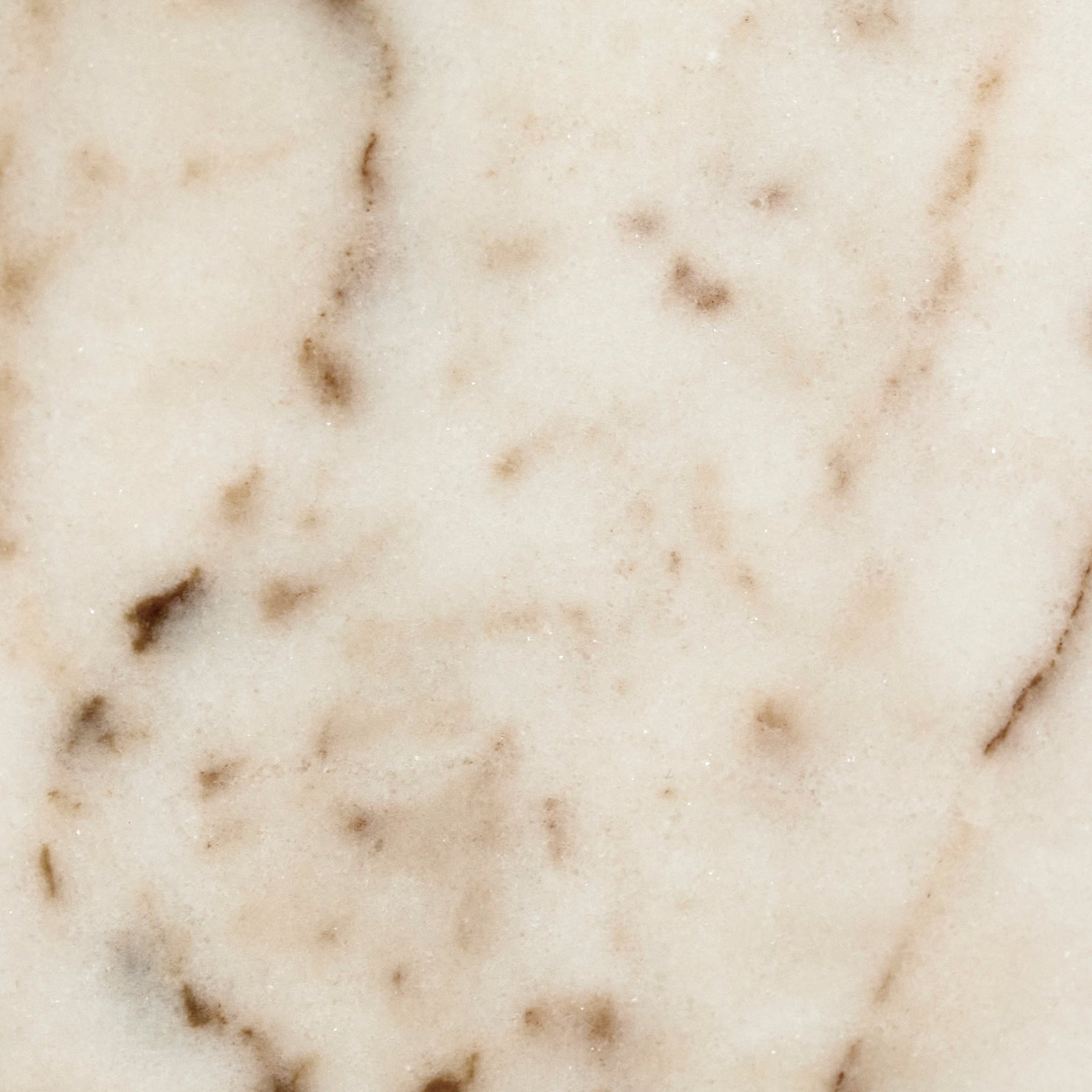 A close-up detail of rose aurora marble.