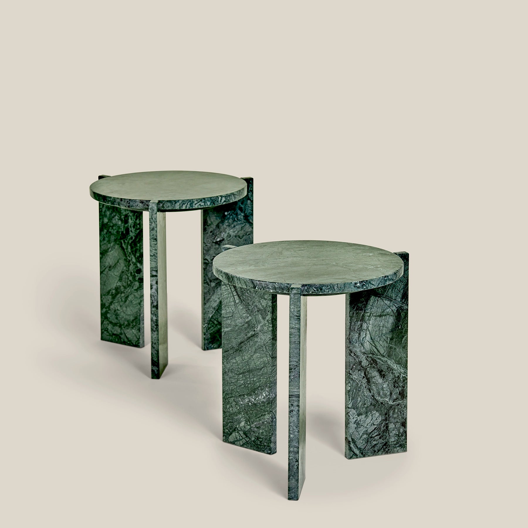 Minerva – two minimalistic, three-legged, round side tables. Made from Cristallo Imperial-marble.