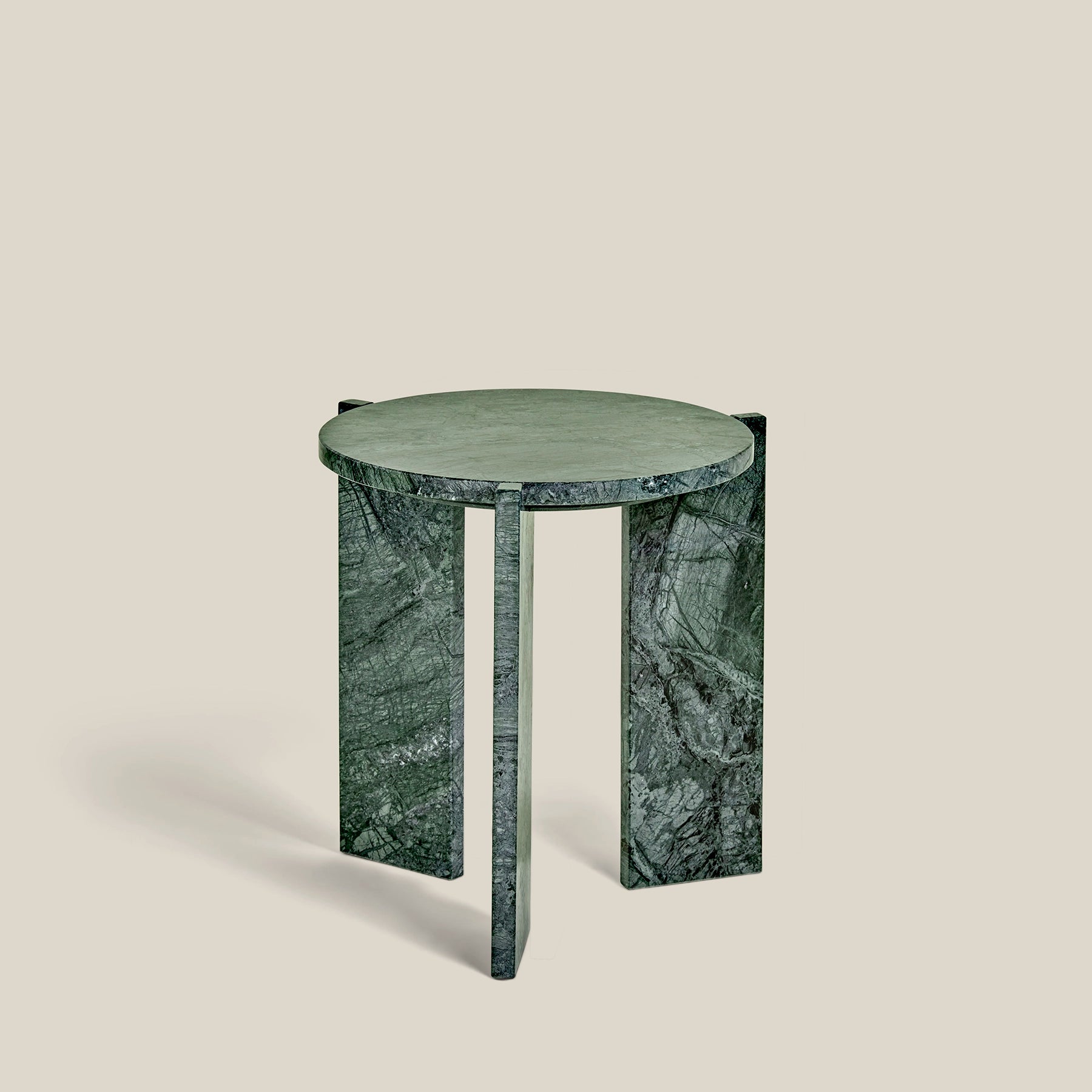 Minerva – a minimalistic, three-legged, round side table. Made from Cristallo Imperial-marble.