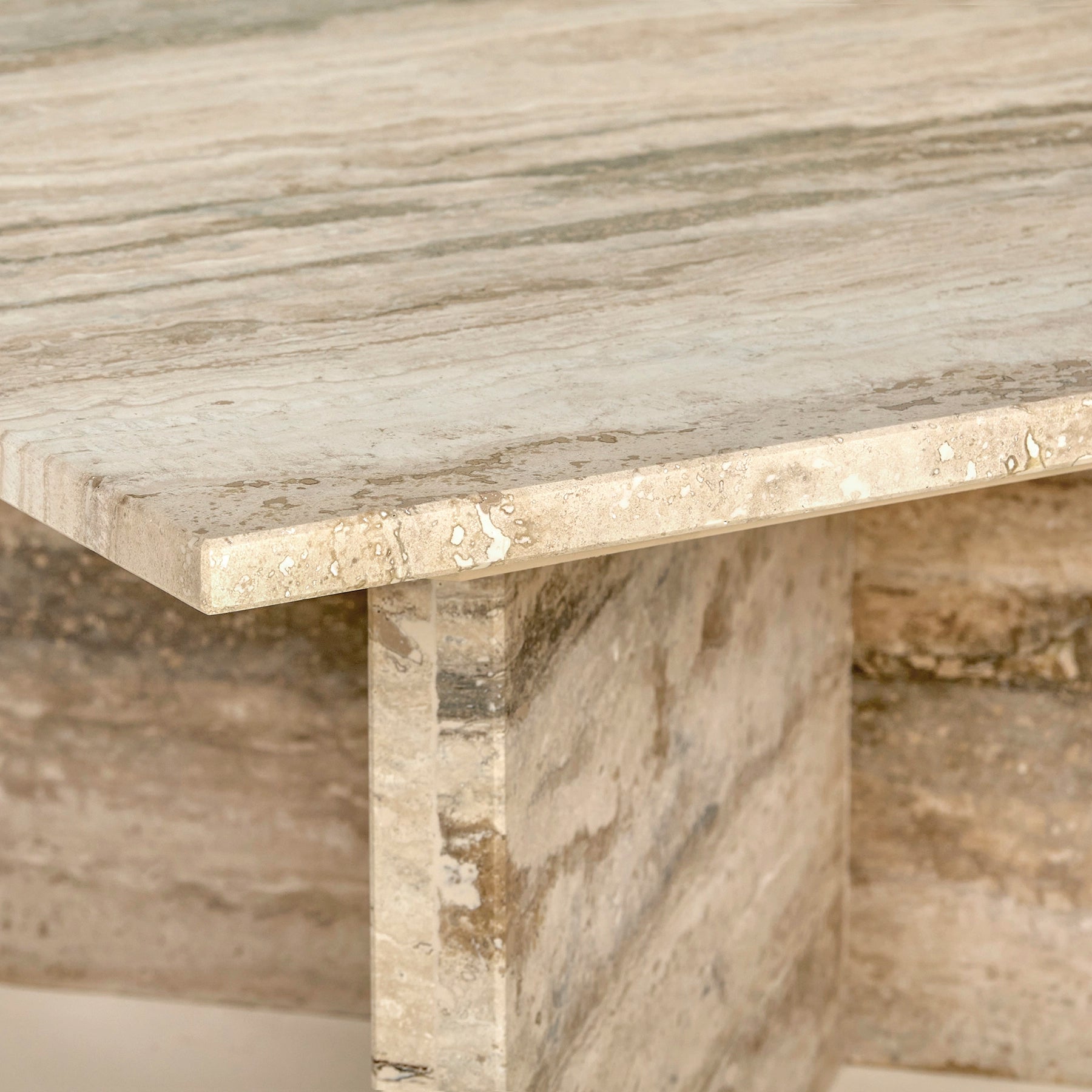 A close-up of the Sofia coffee table made from Honed Travertine marble.