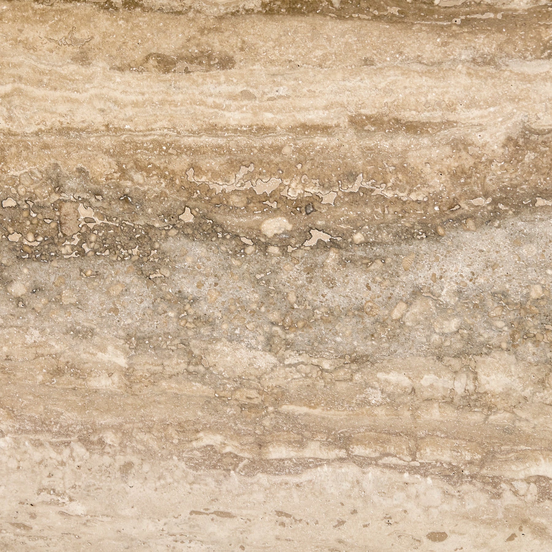 A close-up of Honed Travertine marble from the Sofia coffee table.