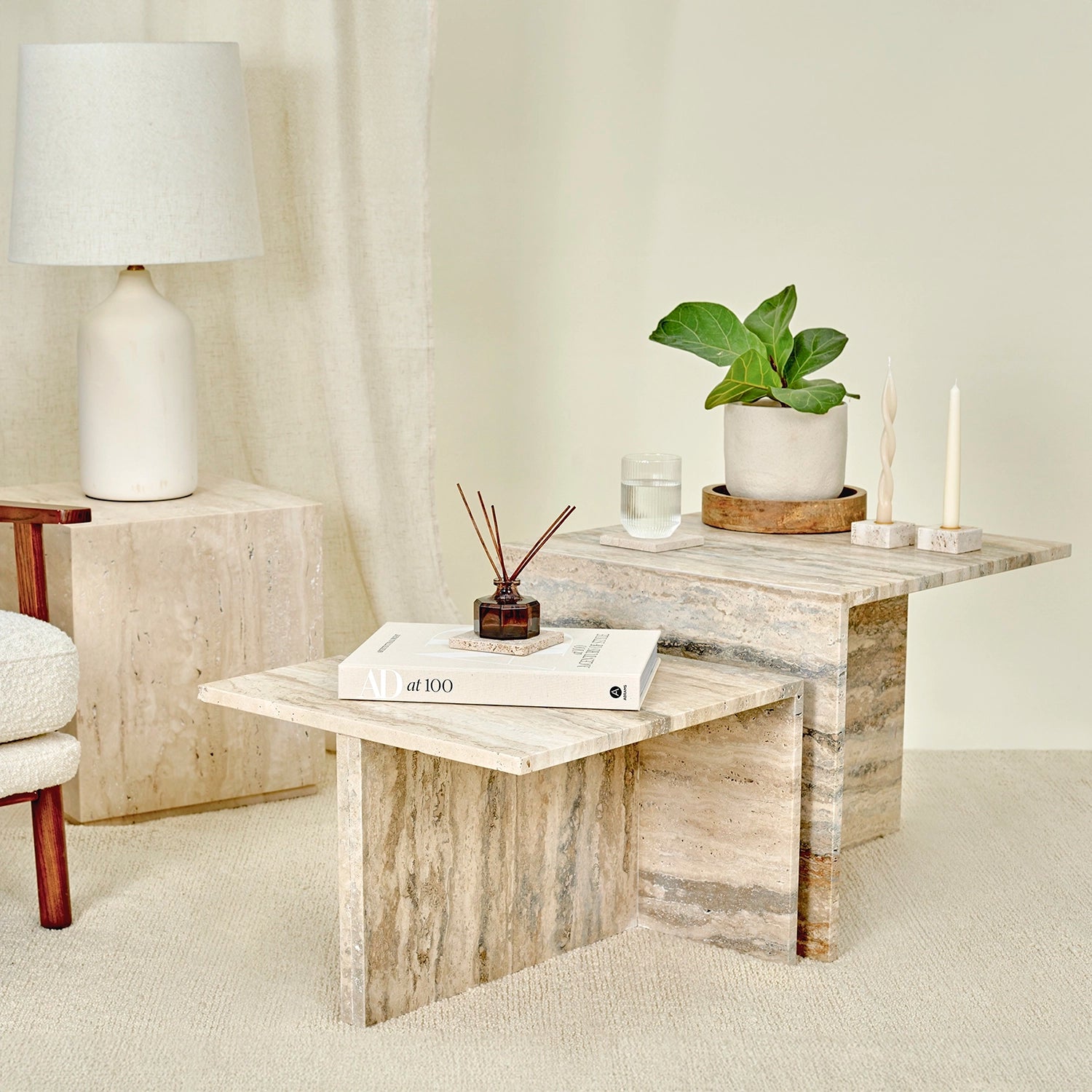 A collection of Travertine marble furniture and accessories. 